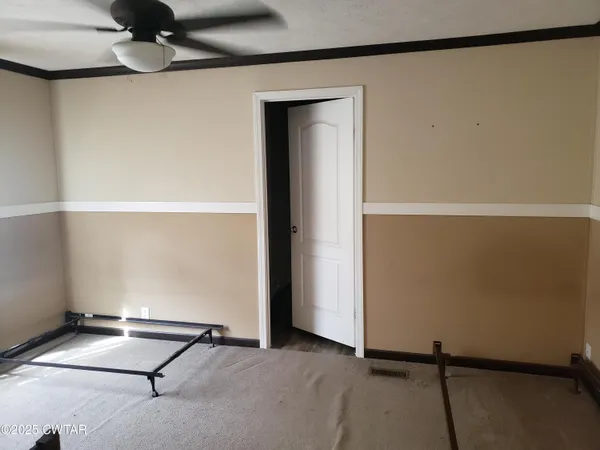 a view of a room with rack on the wall