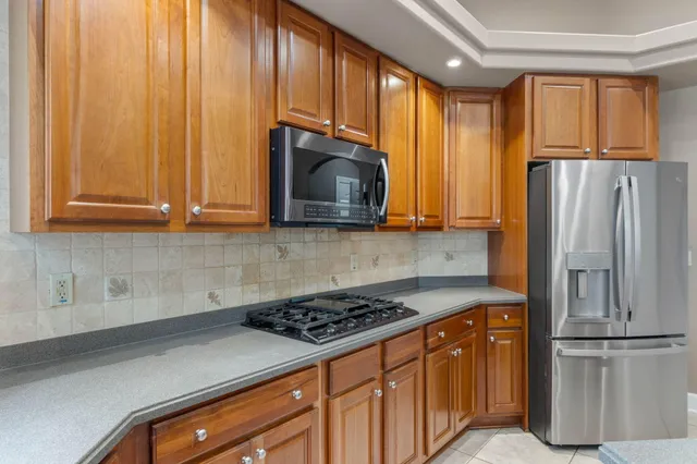a view of a bathroom with a sink and a mirror