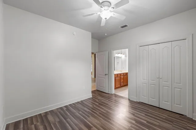 a bathroom with a shower and toilet