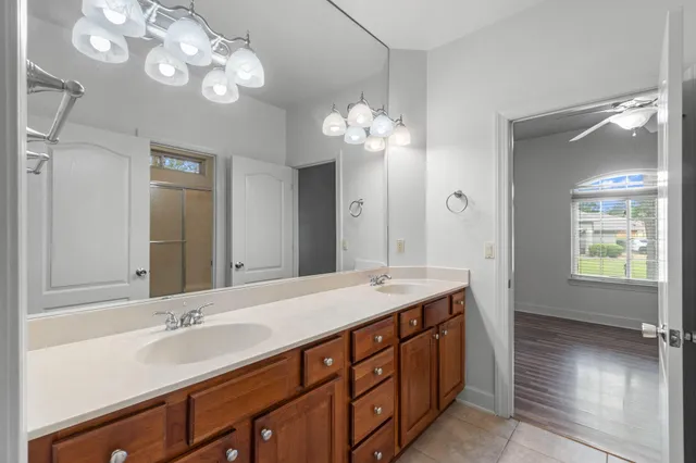 a bathroom with a shower and a toilet