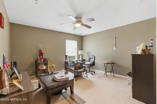 a workspace with furniture and wooden floor