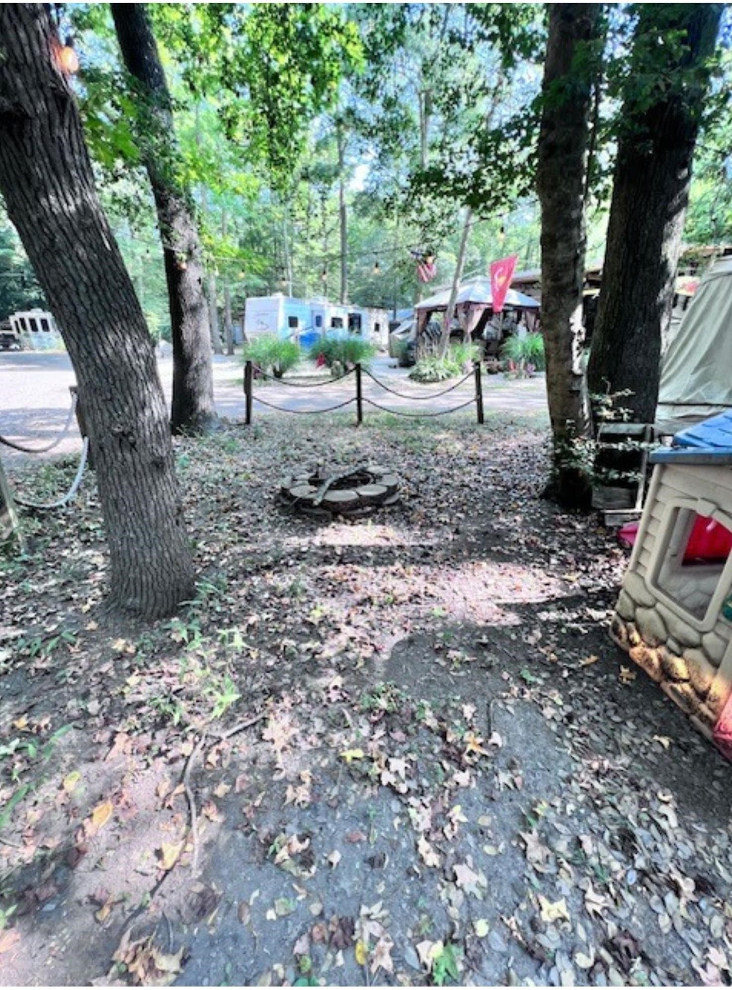 669 9th Cape May, NJ 08204 - Photo 17 of 20 a view of outdoor space with deck and trees