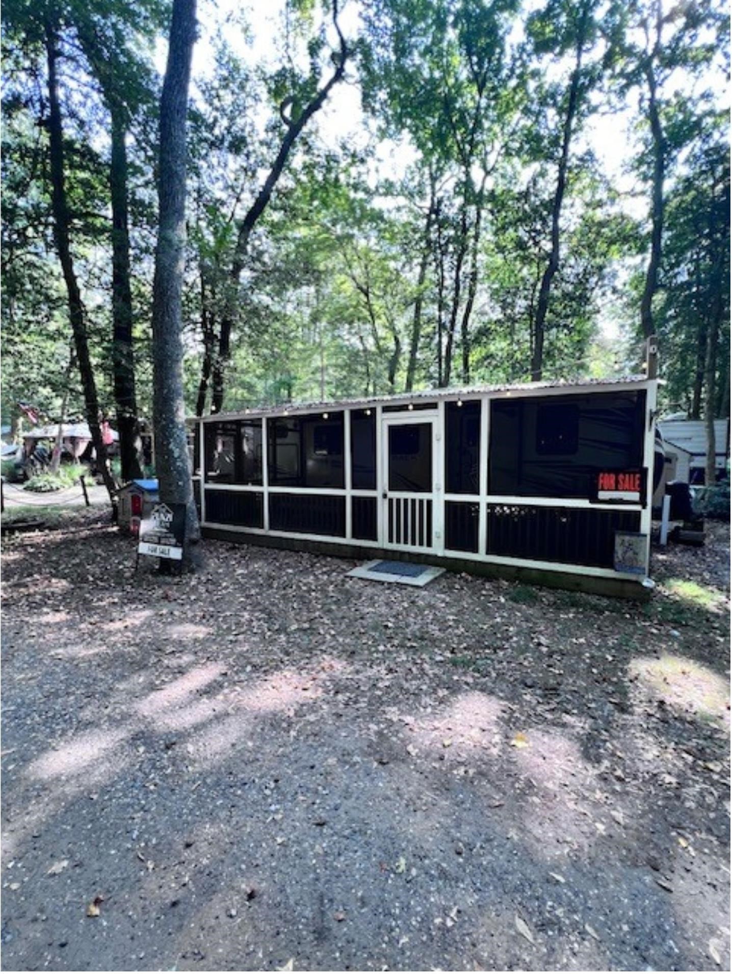 669 9th Cape May, NJ 08204 - Photo 20 of 20 a view of a house with a yard and large trees