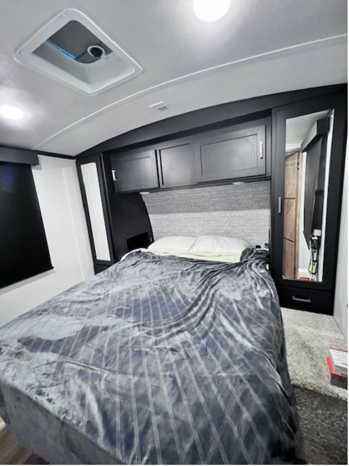 669 9th Cape May, NJ 08204 - Photo 10 of 20 a bedroom with a bed and a mirror