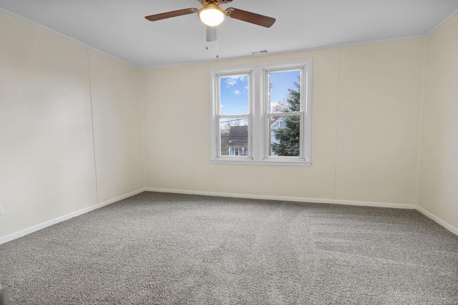 10450 West 93rd Avenue St. John, IN 46373 - Photo 12 of 22 an empty room with a window
