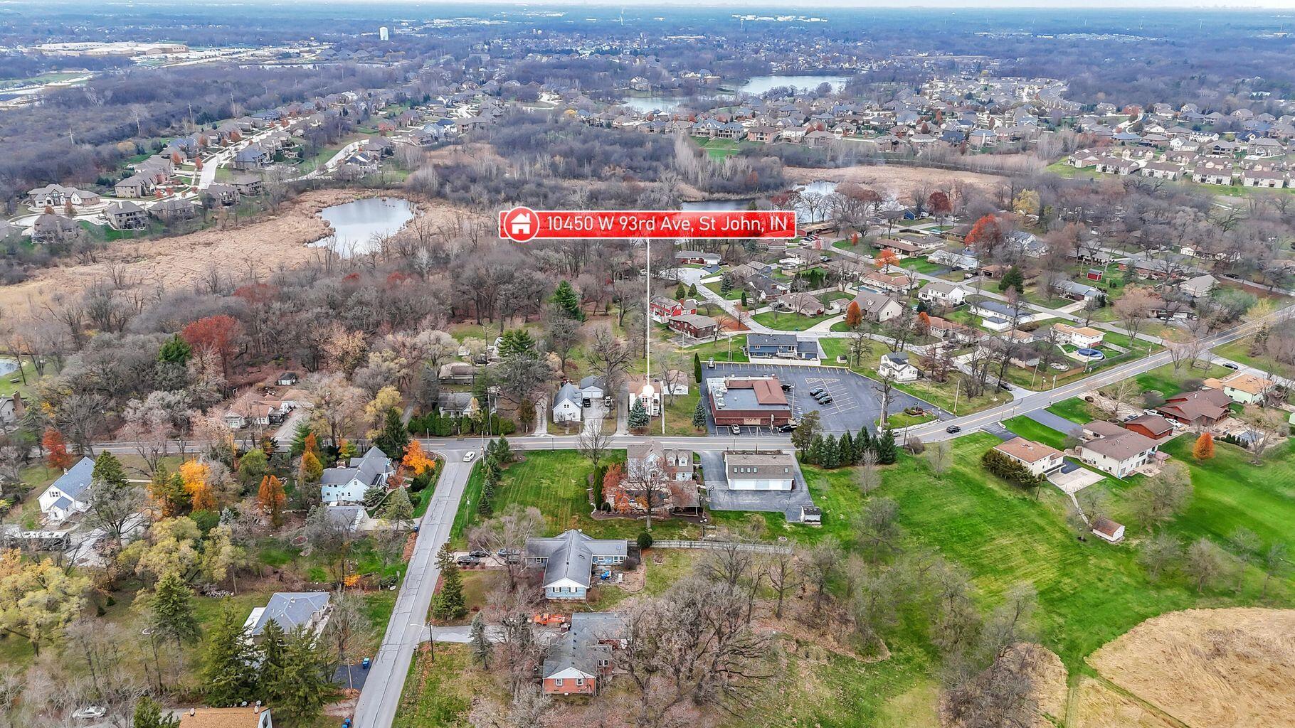 10450 West 93rd Avenue St. John, IN 46373 - Photo 22 of 22 an aerial view of residential houses with outdoor space and swimming pool