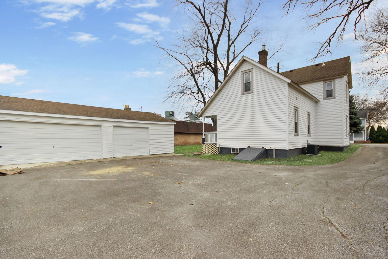 10450 West 93rd Avenue St. John, IN 46373 - Photo 5 of 22 a view of backyard of house