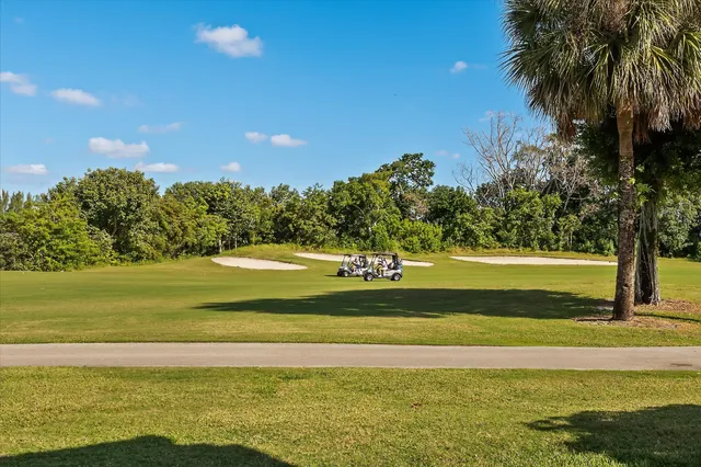 a view of a car parked in front of a house