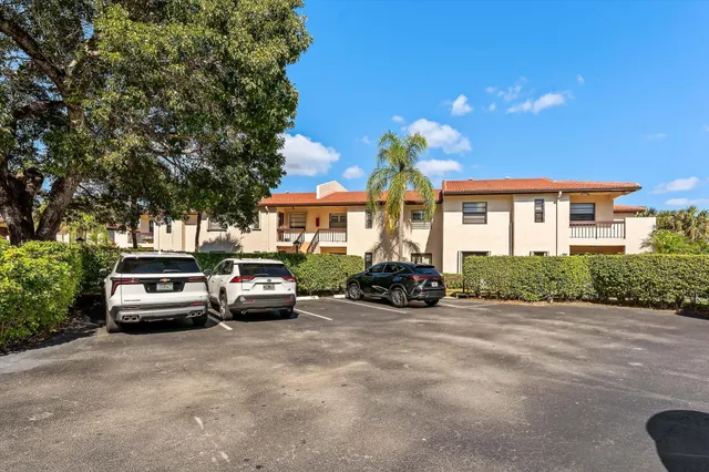 an aerial view of a house with a ocean view