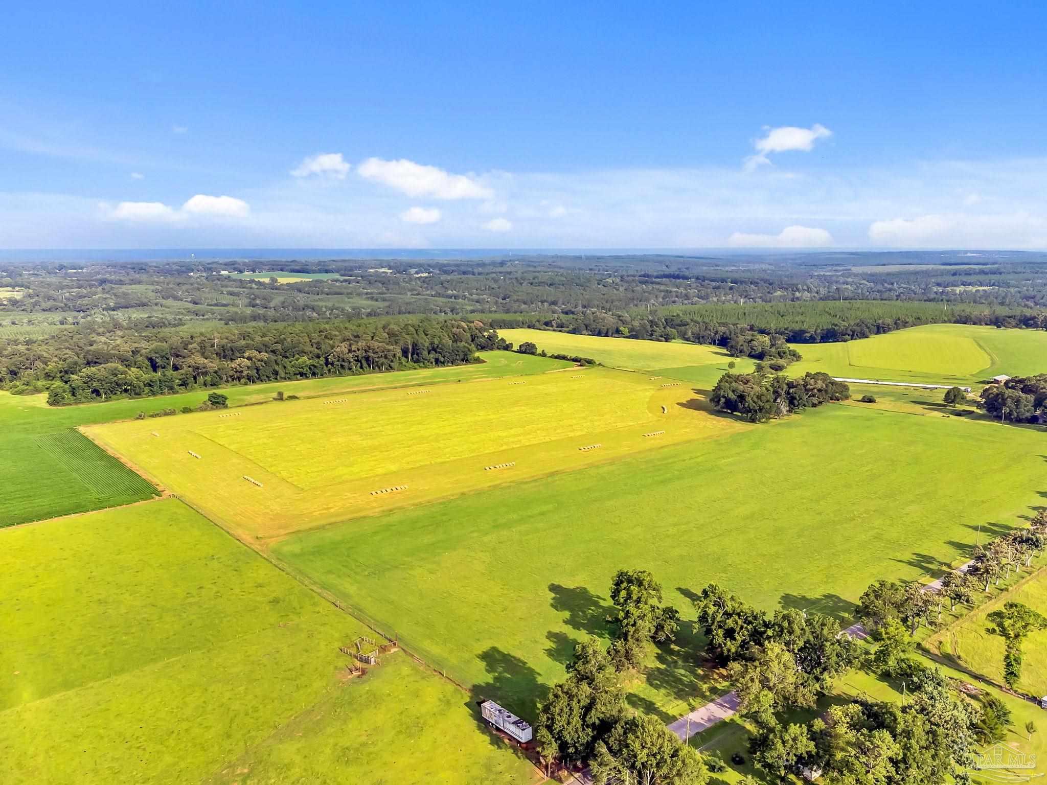 0 Jack Smith Road Century, FL 32535 - Photo 16 of 22 a view of an ocean and beach