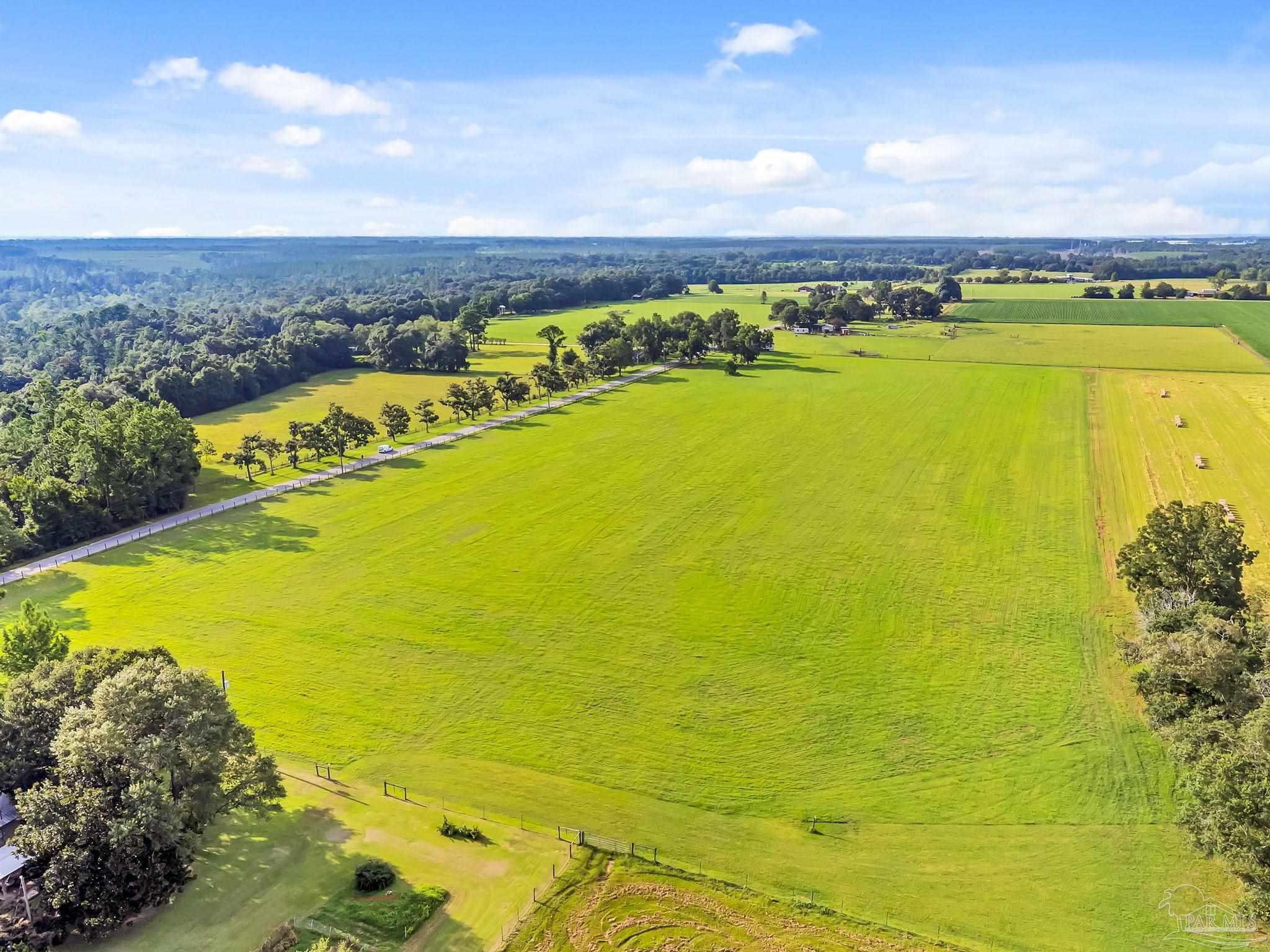 0 Jack Smith Road Century, FL 32535 - Photo 5 of 22 a view of an ocean from a building