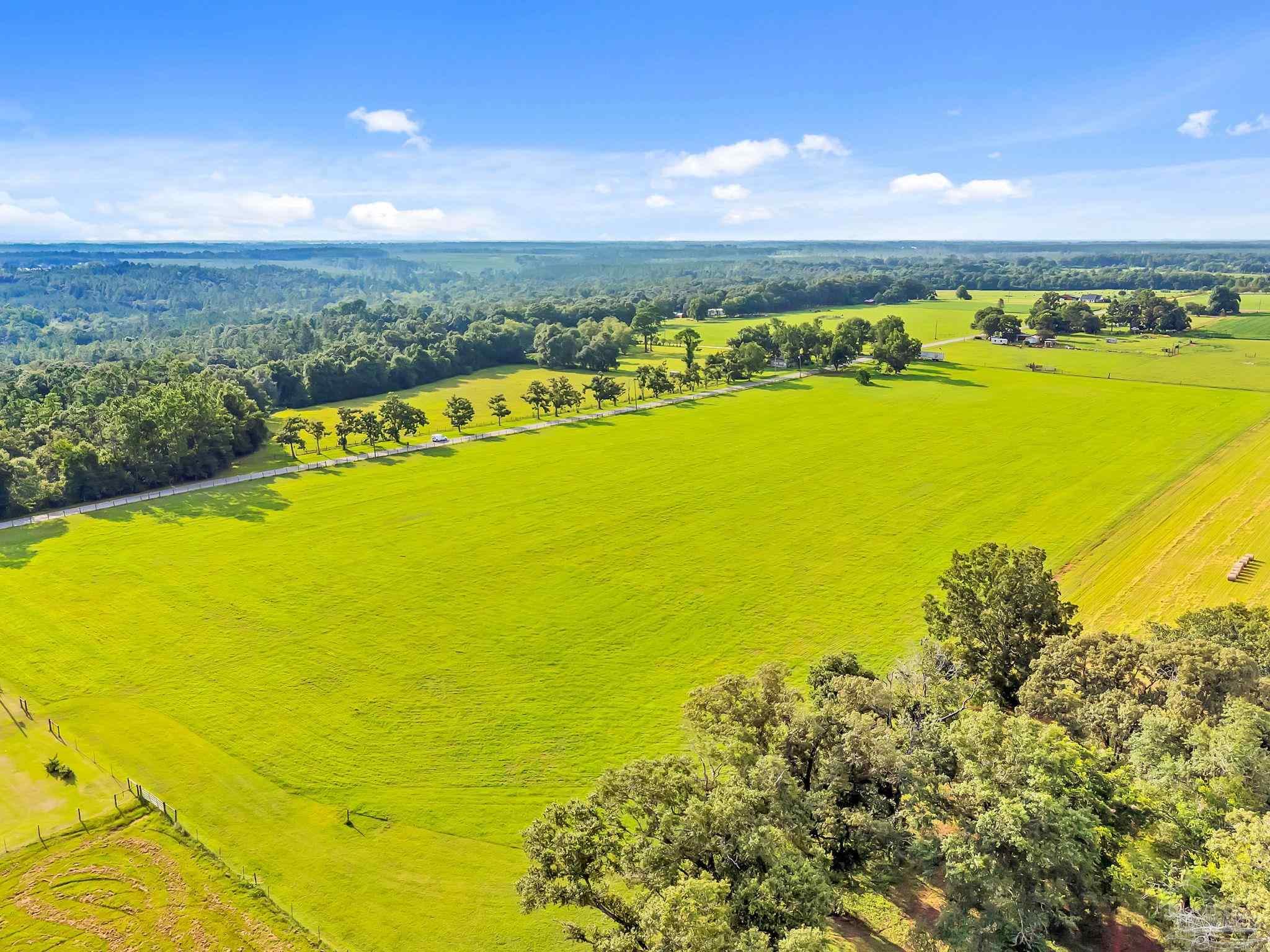 0 Jack Smith Road Century, FL 32535 - Photo 6 of 22 a view of an ocean from a building