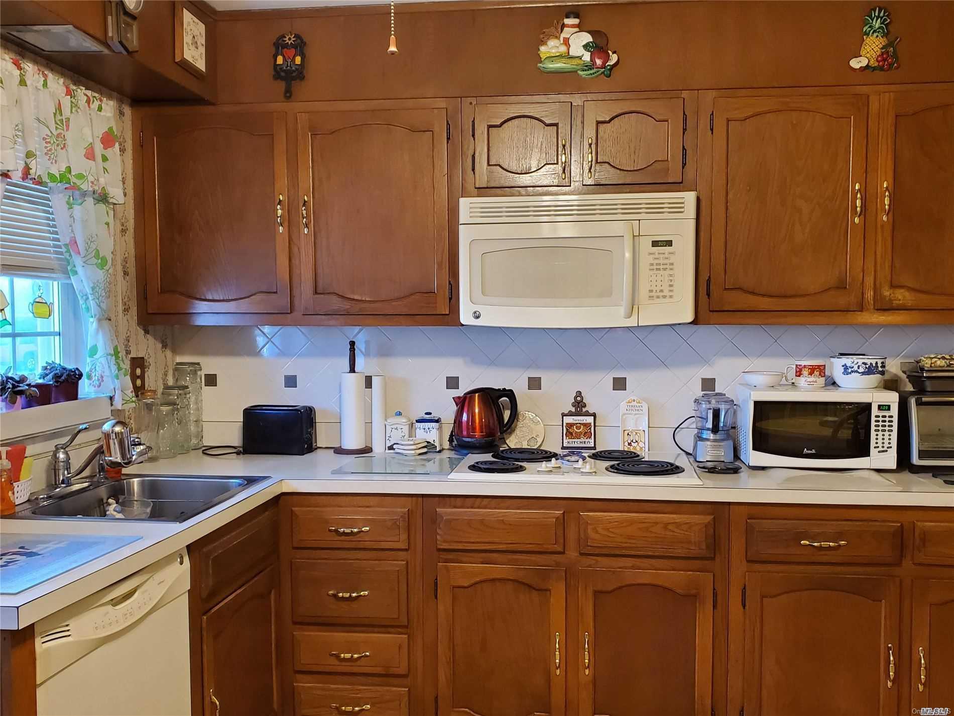 297 Cardiff Court, Unit B Ridge, NY 11961 - Photo 1 of 1 Kitchen