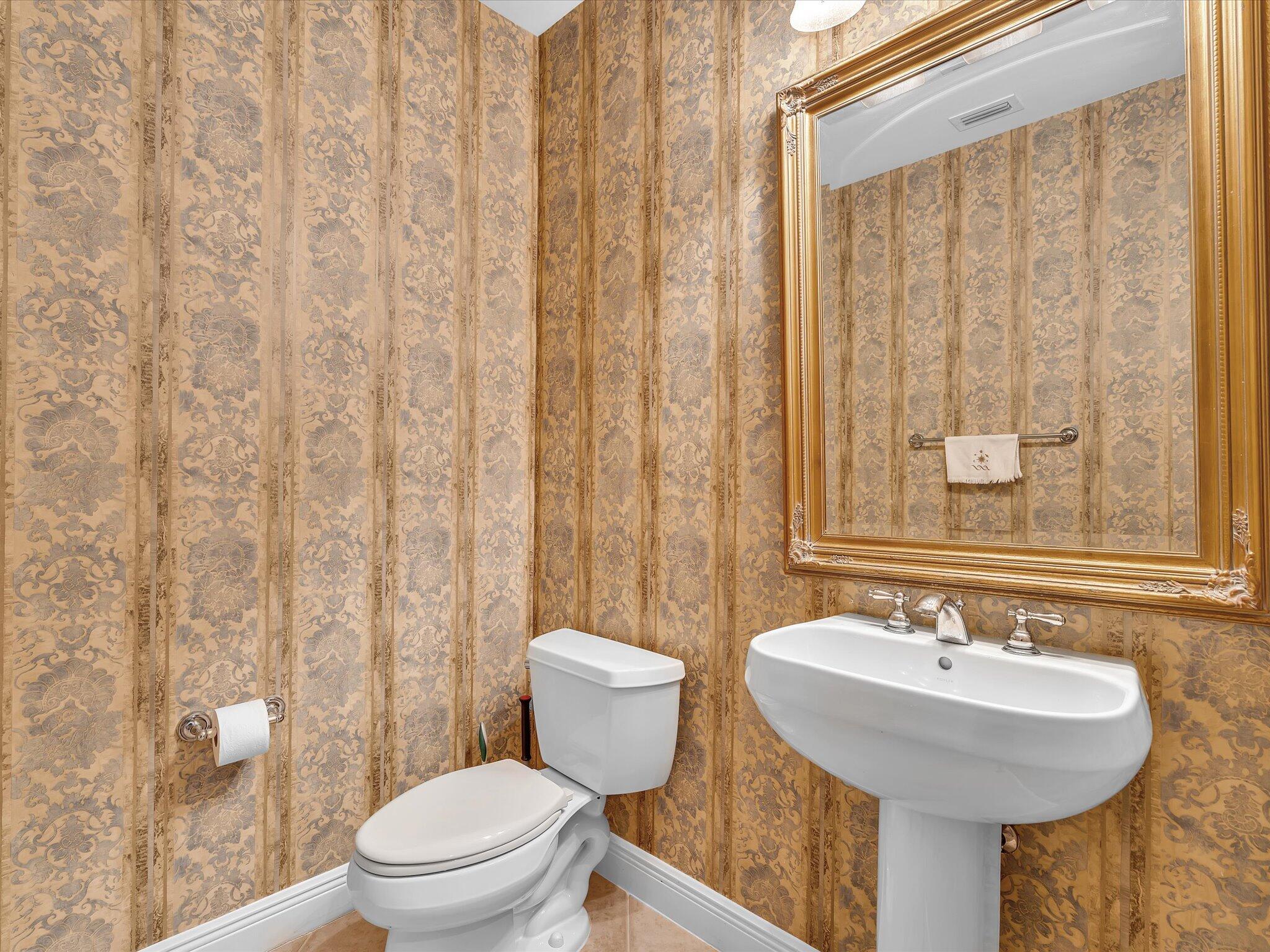 5575 Northeast Trieste Way Boca Raton, FL 33487 - Photo 23 of 38 Main floor half bath