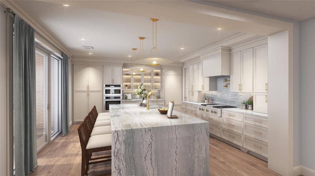 4900 McKinney Avenue, Unit 301 Dallas, TX 75205 - Photo 5 of 7 a kitchen with stainless steel appliances kitchen island granite countertop a sink refrigerator and cabinets