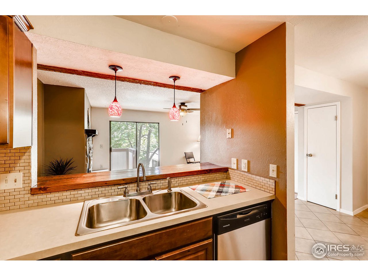 6545 Kalua Road, Unit D Boulder, CO 80301 - Photo 5 of 16 updated bar with pendant lights