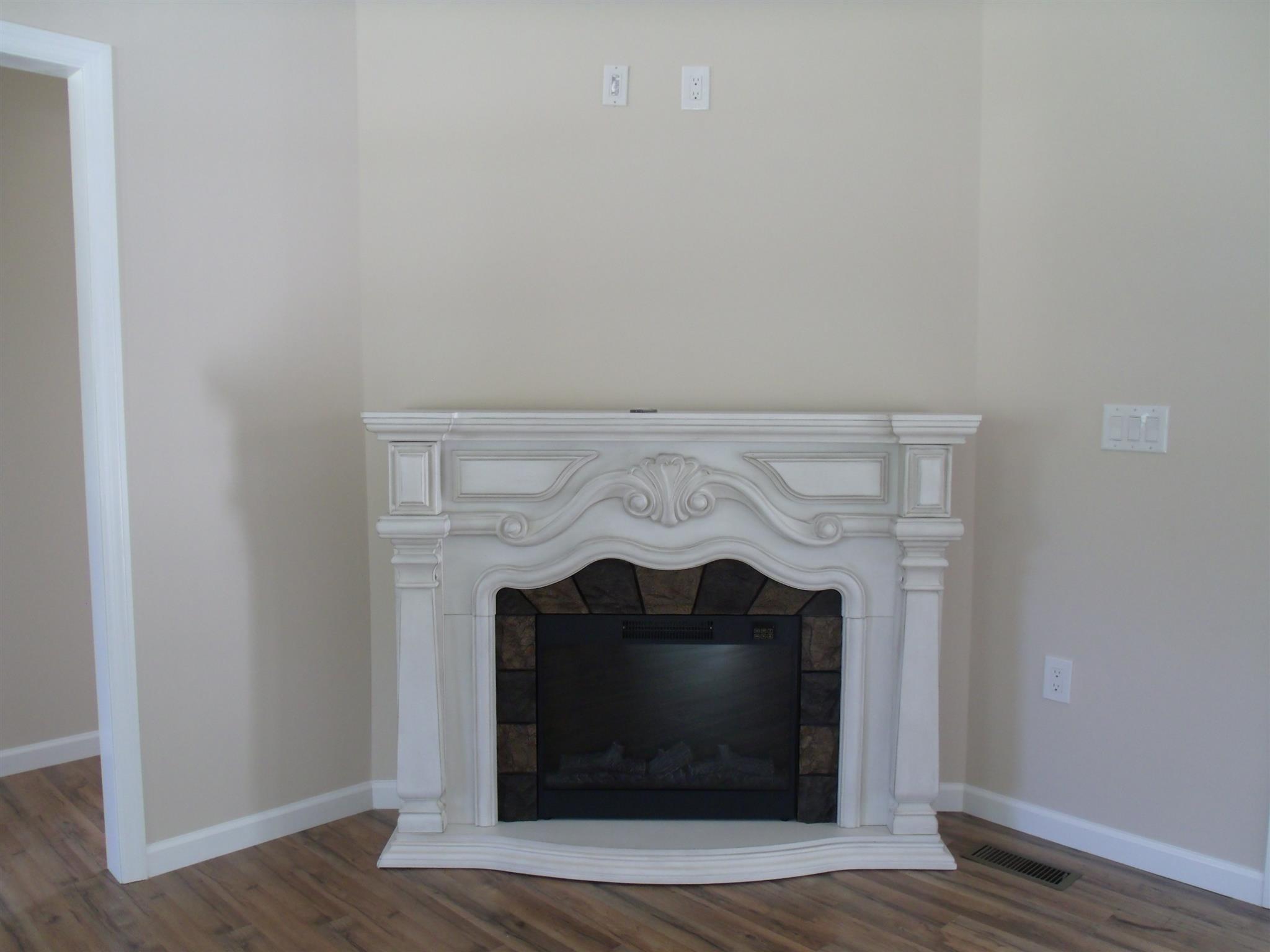 26 Liberty Road Winchester, TN 37398 - Photo 3 of 16 Charming electric fireplace accents this corner perfectly.