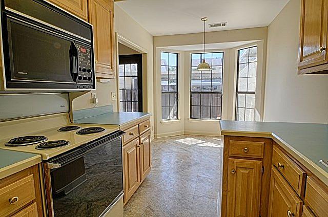 602 Gen George Patton Road Nashville, TN 37221 - Photo 11 of 20 View looking toward the eat-in area of the kitchen, which enjoys lots of sunlight from the bay windows looking out to the back patio.