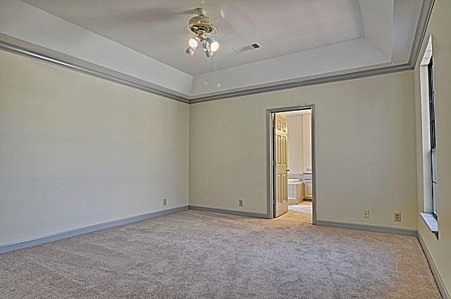602 Gen George Patton Road Nashville, TN 37221 - Photo 12 of 20 The master suite is ready to become your private retreat! It offers new carpeting, a tray ceiling, a ceiling fan light fixture, new paint on the walls and on the trim, and a walk-in closet.