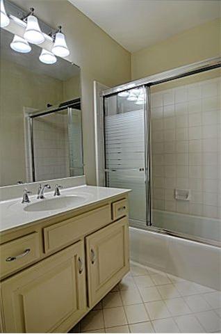 602 Gen George Patton Road Nashville, TN 37221 - Photo 17 of 20 The second full bathroom, adjacent to the second and third bedrooms, features new paint, a new light fixture, and new sink hardware.
