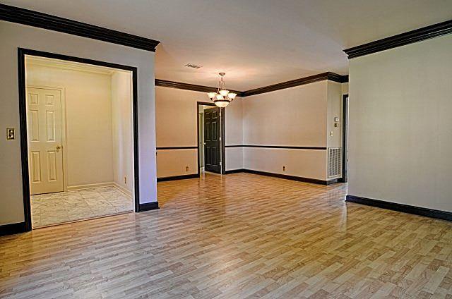 602 Gen George Patton Road Nashville, TN 37221 - Photo 4 of 20 The main living area enjoys a nice openness between the living room and dining room. The dining room has a chair rail and a brand new contemporary light fixture.