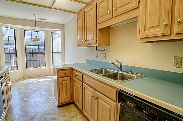 602 Gen George Patton Road Nashville, TN 37221 - Photo 9 of 20 The kitchen was just updated with gorgeous new tile flooring, and fresh new paint.