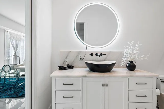 a bathroom with a sink a toilet and a bathtub