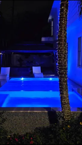 a view of a room with outdoor seating