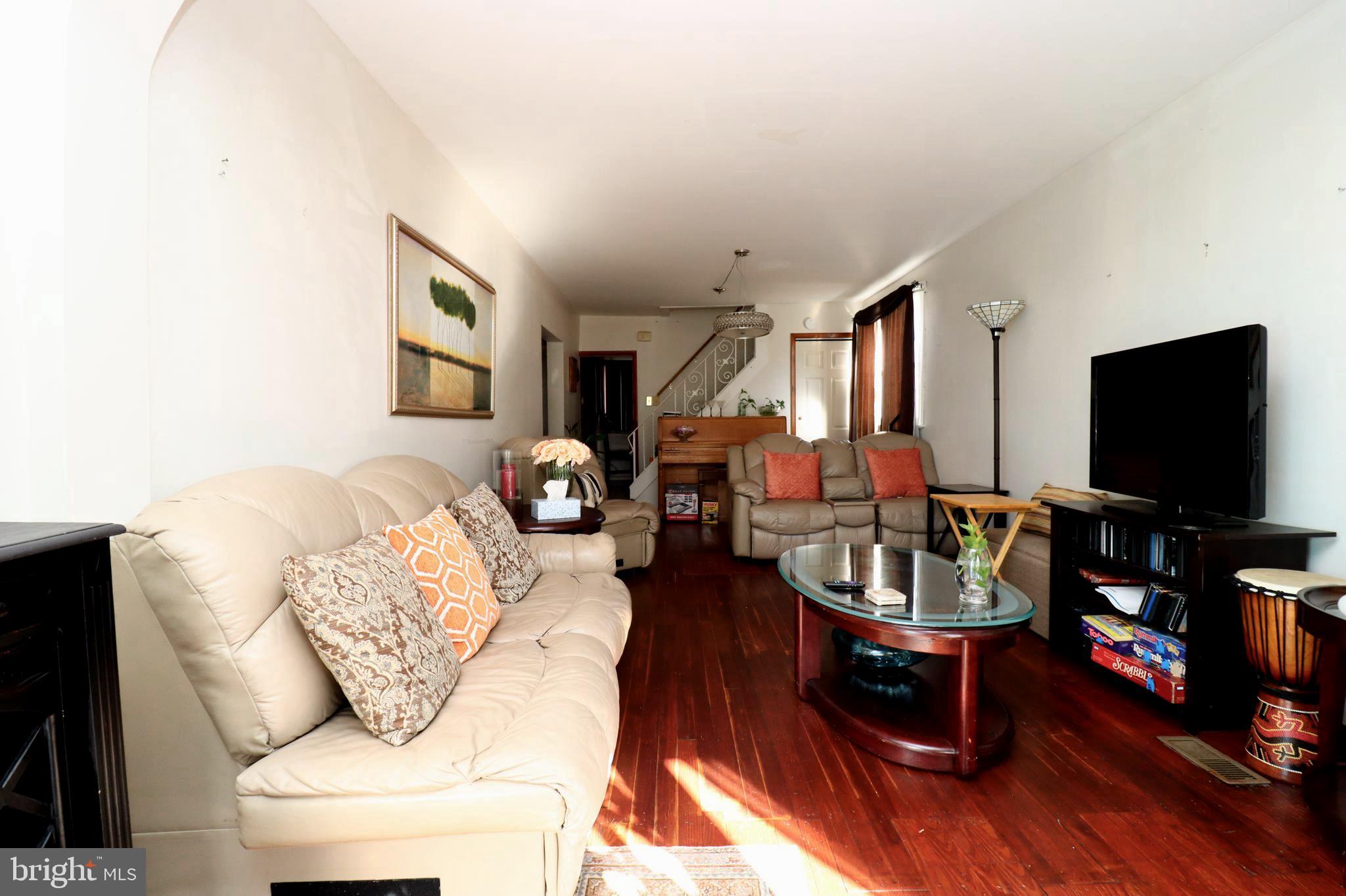 850 Orchard Avenue Runnemede, NJ 08078 - Photo 7 of 26 a living room with furniture and a flat screen tv
