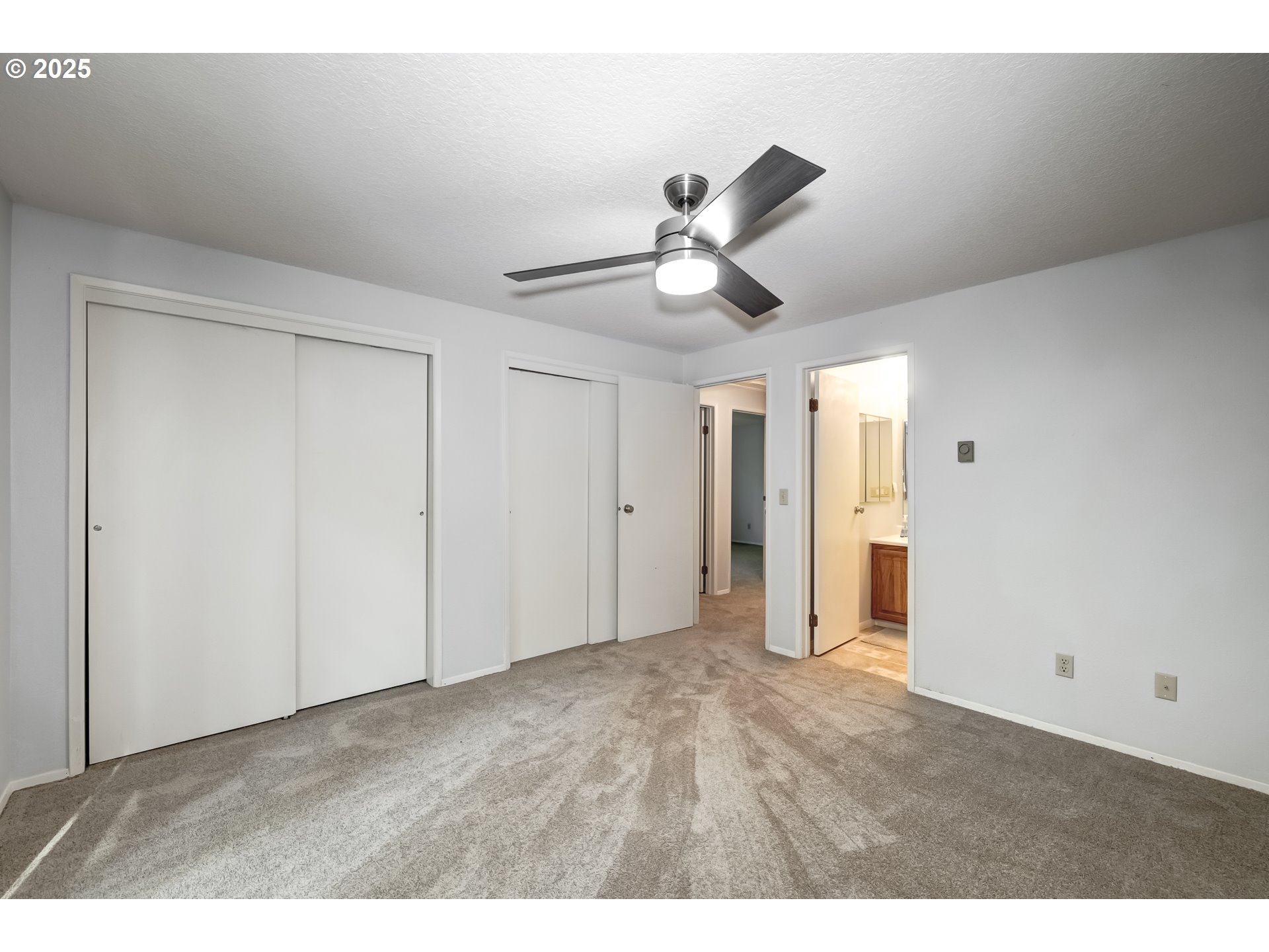 5557 Southwest Multnomah Boulevard Portland, OR 97219 - Photo 17 of 29 a view of empty room with wooden floor