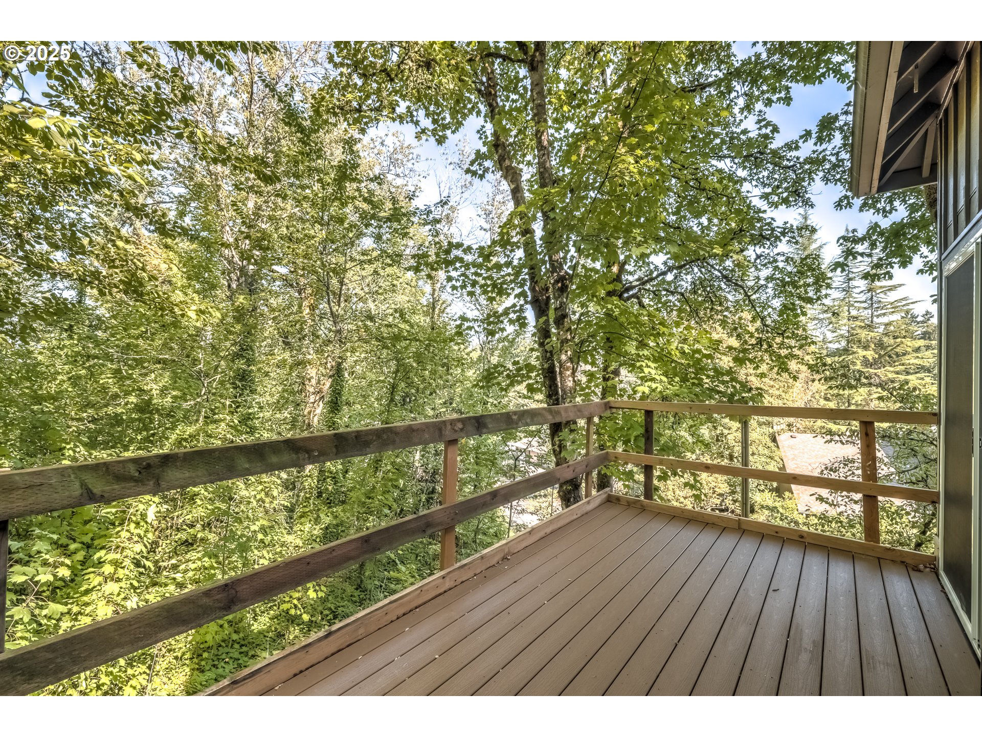 5557 Southwest Multnomah Boulevard Portland, OR 97219 - Photo 26 of 29 a view of mountain with wooden floor