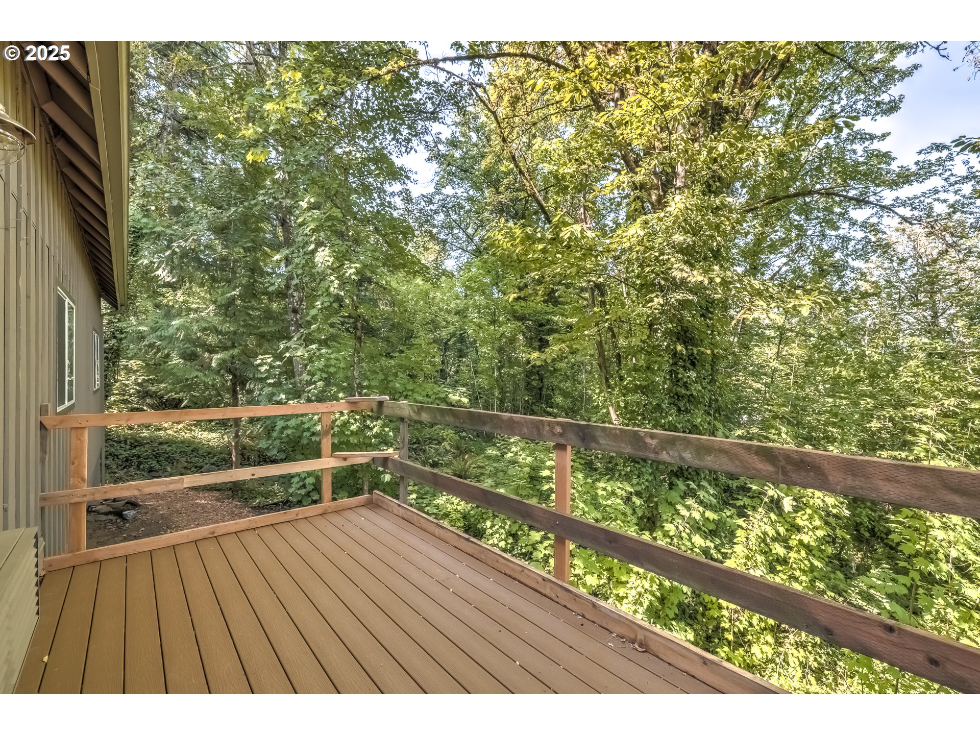 5557 Southwest Multnomah Boulevard Portland, OR 97219 - Photo 27 of 29 a view of mountain with wooden floor