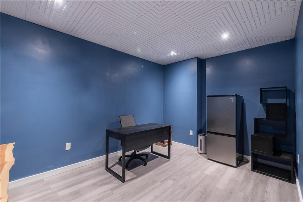 892 Durant Place Northeast Atlanta, GA 30309 - Photo 30 of 51 a view of workspace with wooden floor and furniture