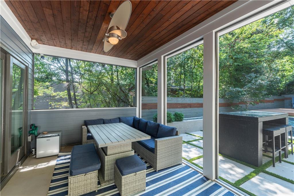 892 Durant Place Northeast Atlanta, GA 30309 - Photo 31 of 51 a balcony with furniture and wooden floor