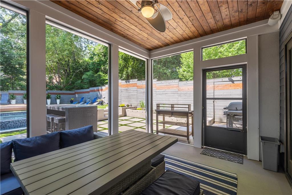 892 Durant Place Northeast Atlanta, GA 30309 - Photo 32 of 51 a outdoor space with the couches and dining table with the garden view