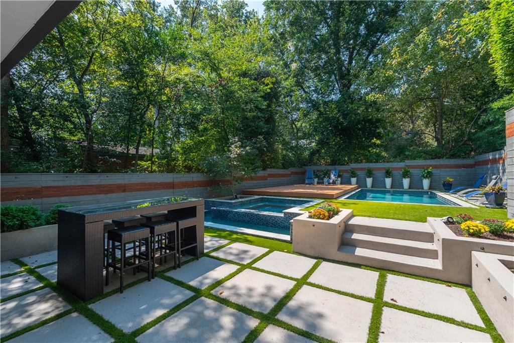 892 Durant Place Northeast Atlanta, GA 30309 - Photo 35 of 51 a view of swimming pool with chairs