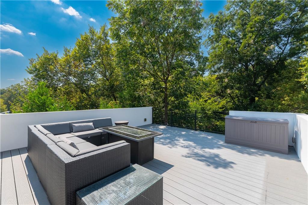 892 Durant Place Northeast Atlanta, GA 30309 - Photo 38 of 51 a view of barbeque grill with wooden fence