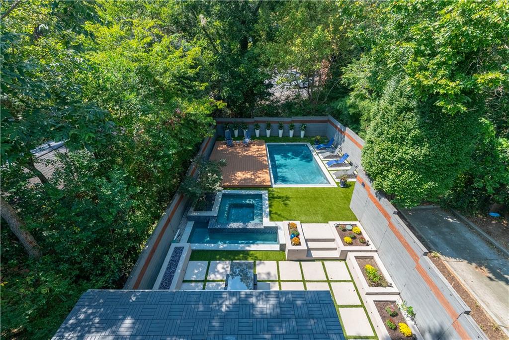 892 Durant Place Northeast Atlanta, GA 30309 - Photo 39 of 51 a view of a yard with a bench