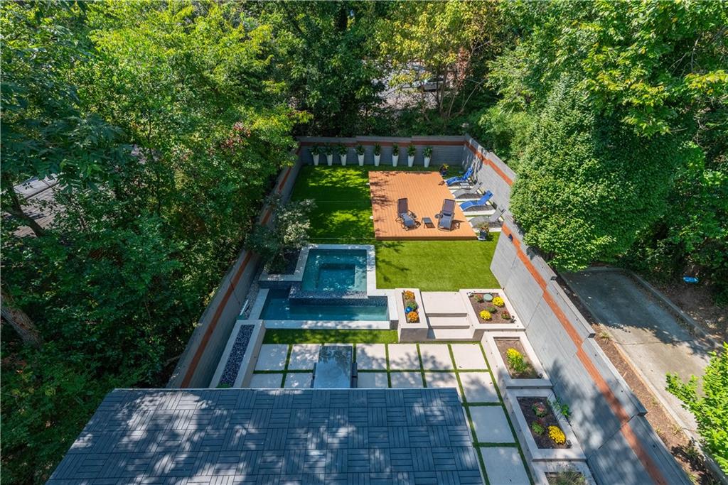 892 Durant Place Northeast Atlanta, GA 30309 - Photo 40 of 51 a balcony with wooden floor and outdoor seating