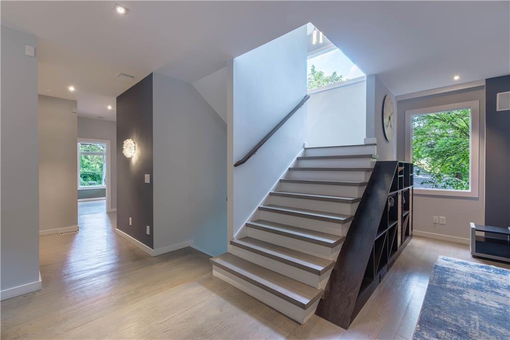 892 Durant Place Northeast Atlanta, GA 30309 - Photo 6 of 51 a view of entryway and hall with wooden floor