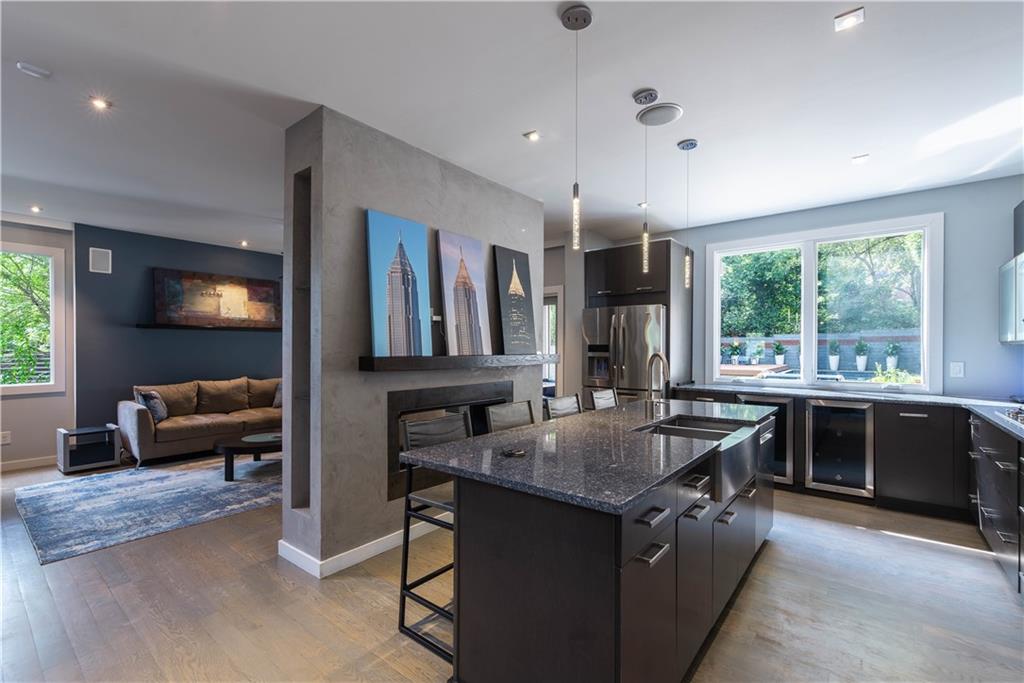 892 Durant Place Northeast Atlanta, GA 30309 - Photo 10 of 51 a kitchen with a stove sink and microwave