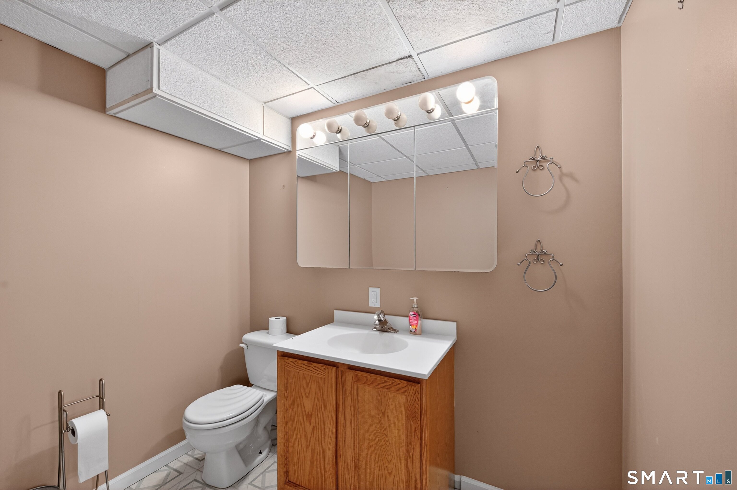 724 Strong Road South Windsor, CT 06074 - Photo 28 of 39 a bathroom with a sink a toilet and shower