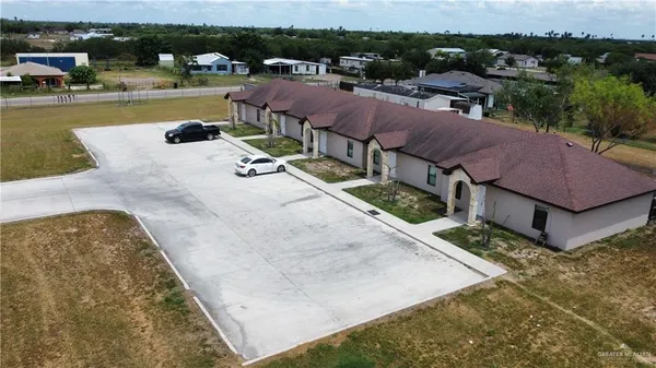 a view of a swimming pool with lounge chair