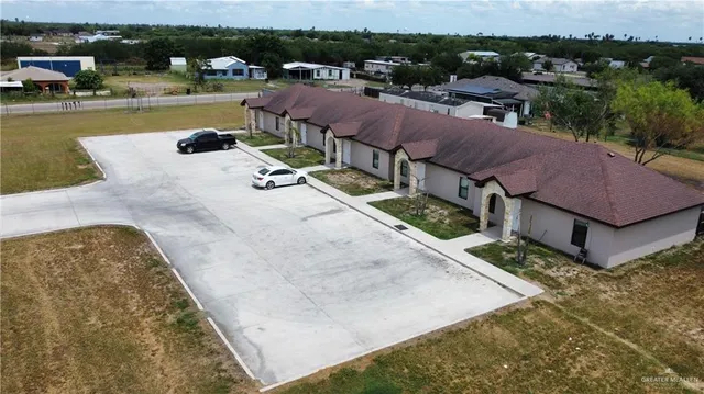 a view of a swimming pool with lounge chair
