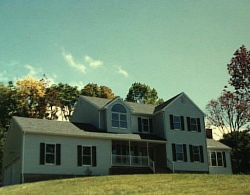 L Pleasant View Road New Milford, CT 06776 - Photo 1 of 1 a front view of a house with a yard