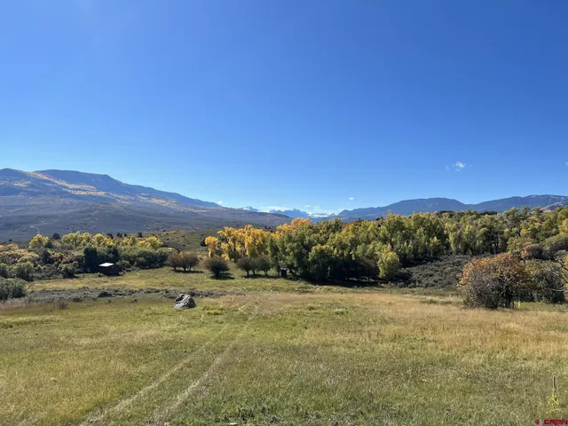a view of lake and mountain