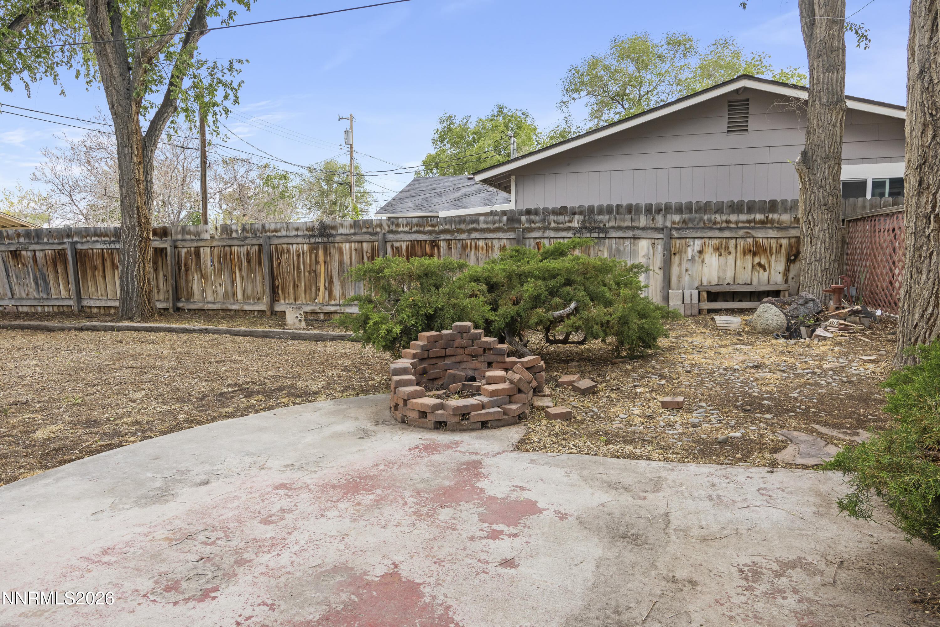 511 Churchill Street Fallon, NV 89406 - Photo 28 of 37 front view of a house with a small yard