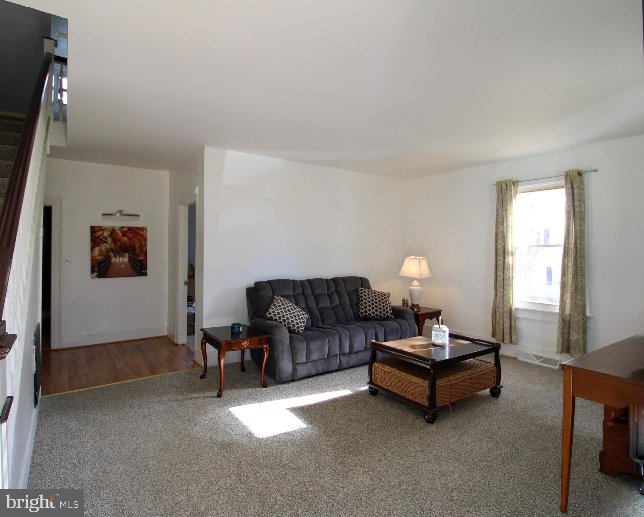 2486 Owl Town Road Callao, VA 22435 - Photo 5 of 14 a living room with furniture and a window
