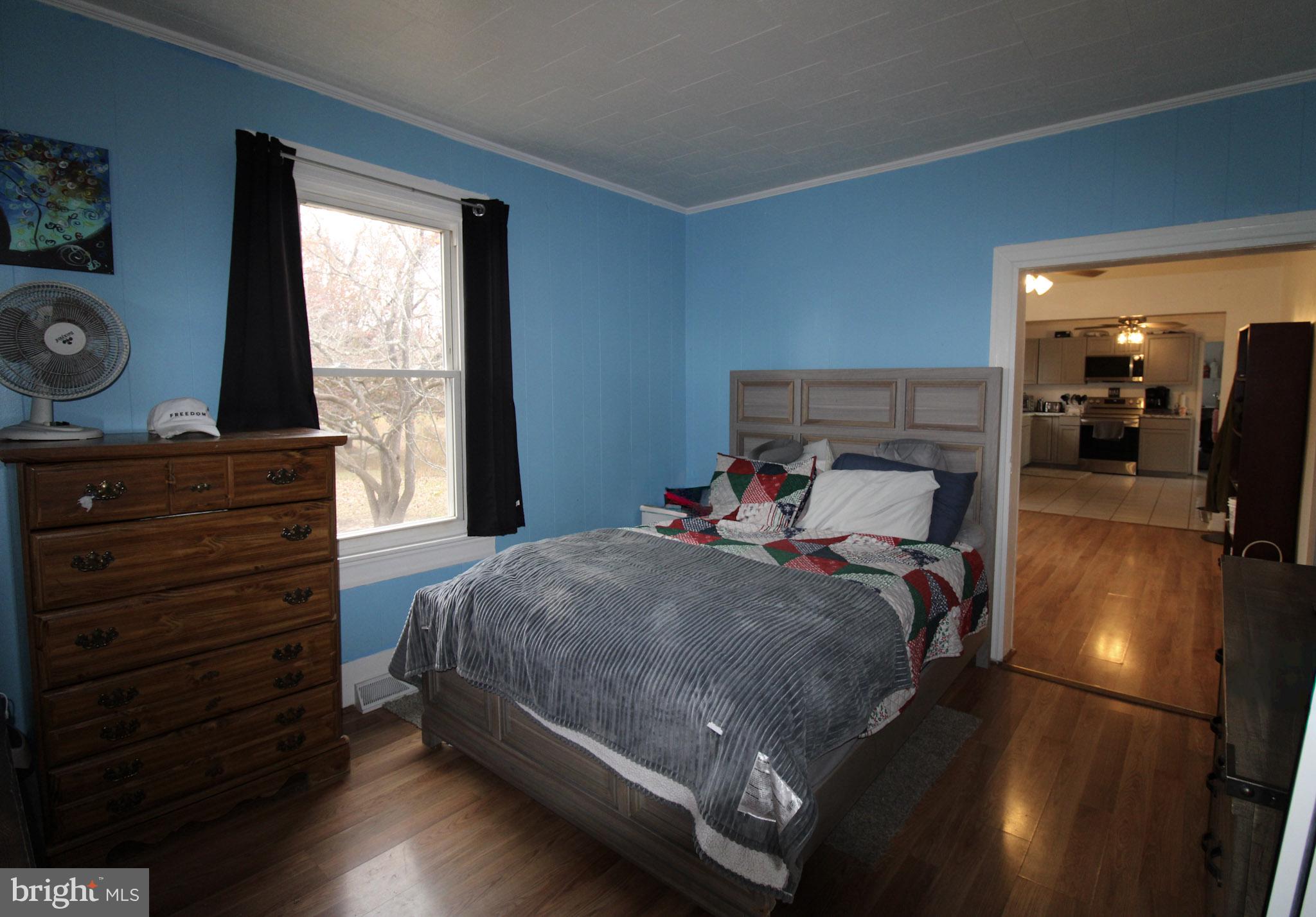 2486 Owl Town Road Callao, VA 22435 - Photo 8 of 14 a bedroom with a bed and window