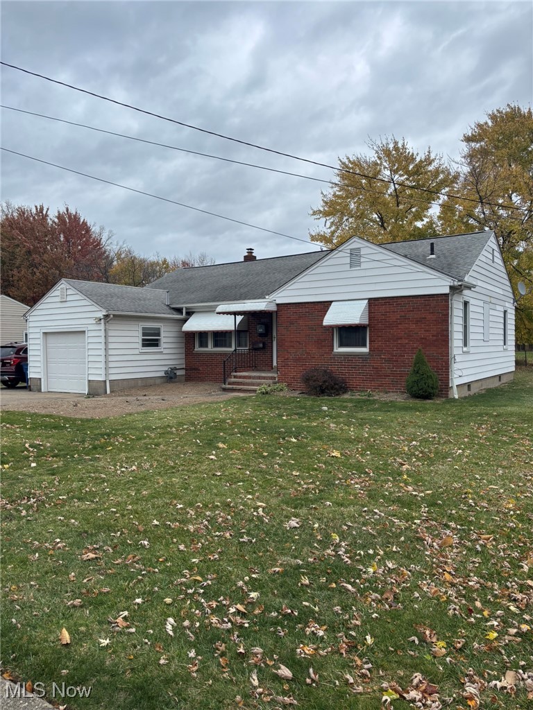 1039 Center Road Eastlake, OH 44095 - Photo 2 of 29 Classic brick front featuring 1-car attached garage